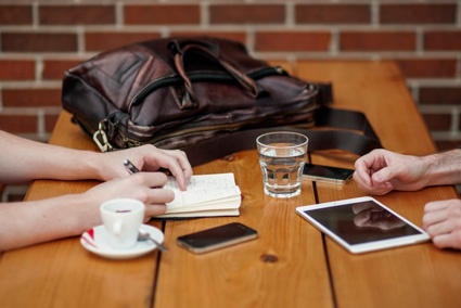 Image of people meeting to share business information. Image of people meeting to share business information.