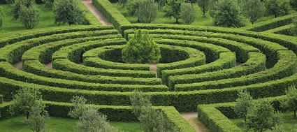 Inbound marketing strategy Image of topiary maze featuring tree and shrubs. Avoid the maze of potential factors with A/B website testing.