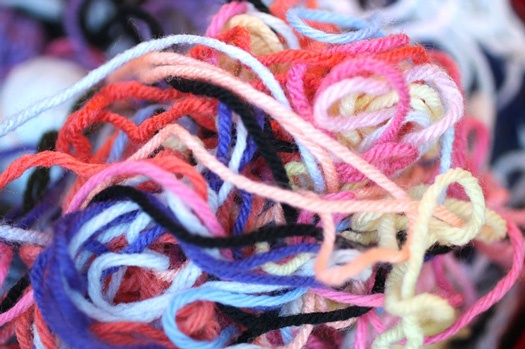 Image of tangled yarn. A/B website testing shouldn't involve untangling a mess of possible threads.