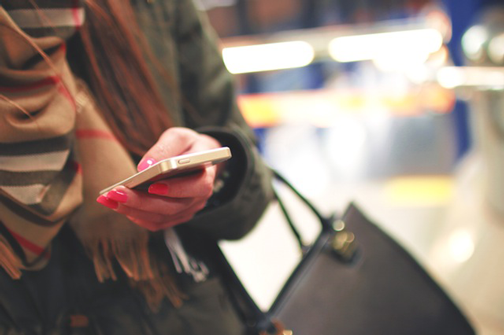 Iage of woman holding smartphone. Inbound marketing solutions should understand consumers. Iage of woman holding smartphone. Inbound marketing solutions should understand consumers.