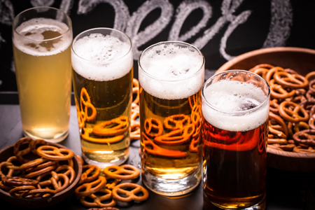 Image of beer glasses and pretzels. Pairing of inbound marketing solutions and the buyers process.