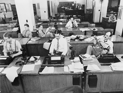 Image of old New York Times newsroom. Your visitors don’t want yesterday’s news; give them a fresh website design with engaging and updated content. 