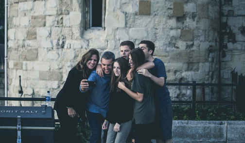 Image of people taking a selfie. Inbound marketing strategies are about connecting with people.