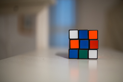 Image of a Rubik's cube. Sales success can hinge on your ability to provide customer solutions.