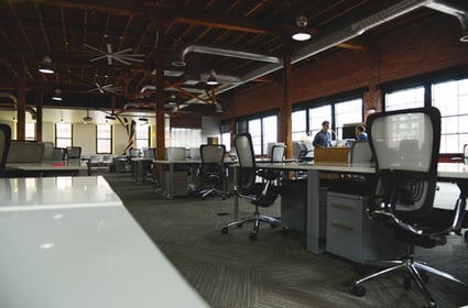 Image of an open office space. Changes to your business could signify a need to update your branding.
