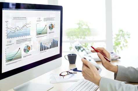 Image of person using computer for marketing analytics and measuring. Image of person using computer for marketing analytics and measuring.